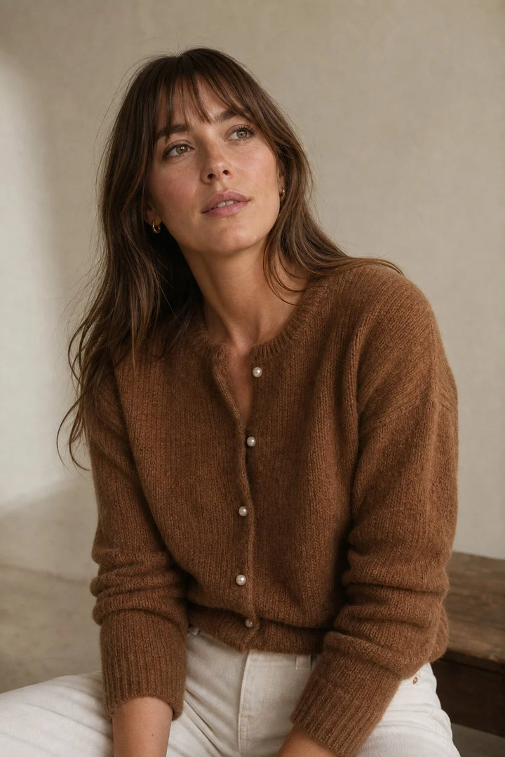 Back view of women's mohair top cardigan showing ribbed hem and relaxed drape