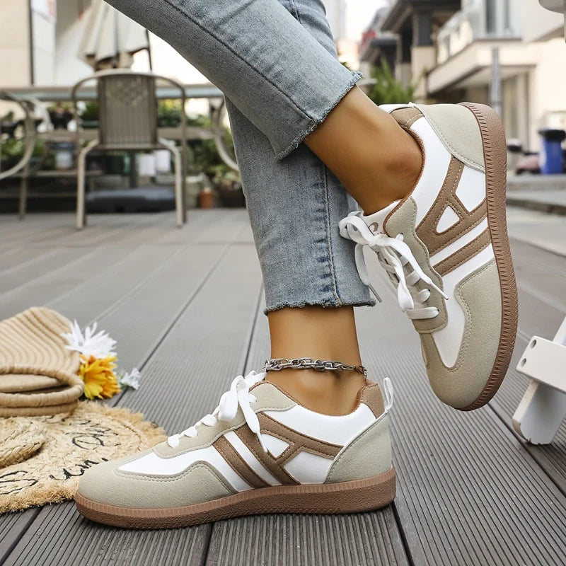 Women's wide-toe trainers from above showing rounded toe box and lace-up closure