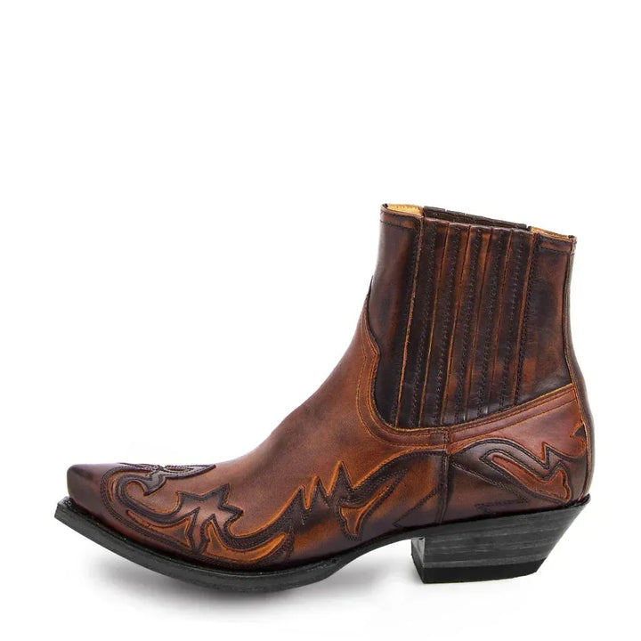 Side view of men's cowboy boots showing elastic panels and angled block heel design