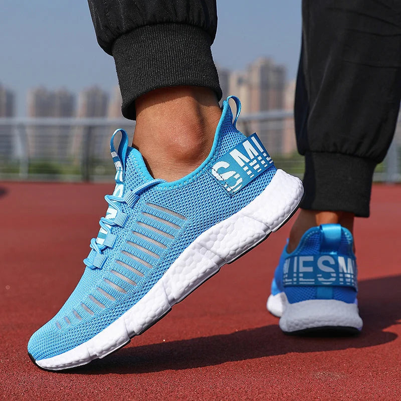 Men's knit trainers in sky blue displaying breathable upper and supportive fit