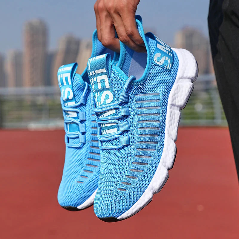 Men's knit trainers with white cushioned midsole and black grip outsole detail