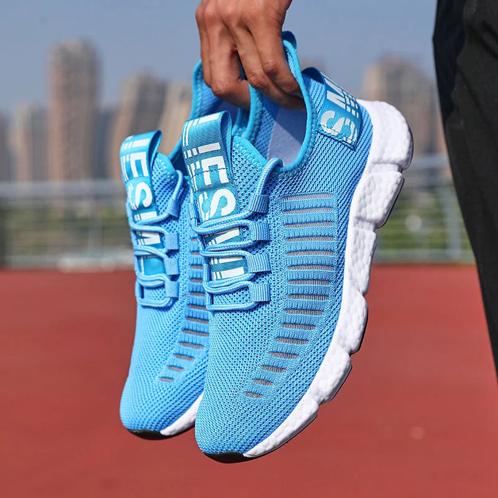 Men's knit trainers with white cushioned midsole and black grip outsole detail