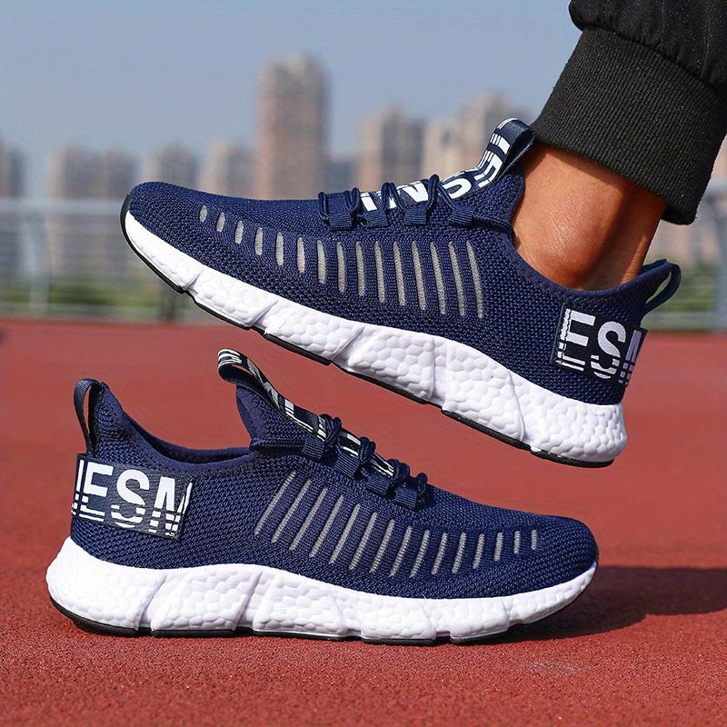 Men's knit trainers displaying lightweight knit construction and padded ankle collar detail