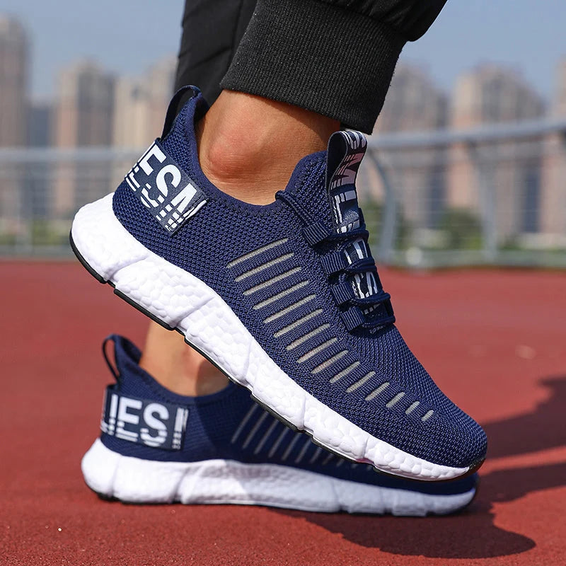 Men's knit trainers showing side profile with ribbed panels and supportive structure