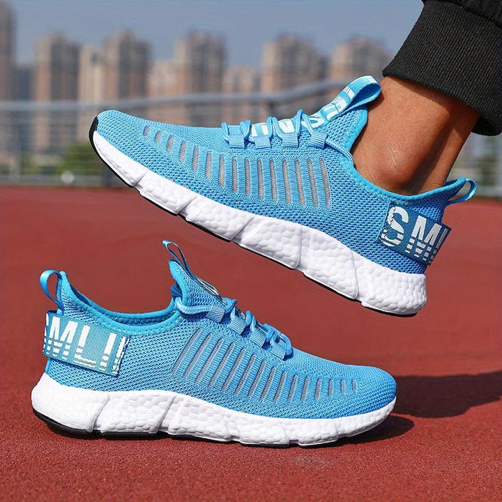 Men's knit trainers featuring lace-up closure and pull tab for easy wear