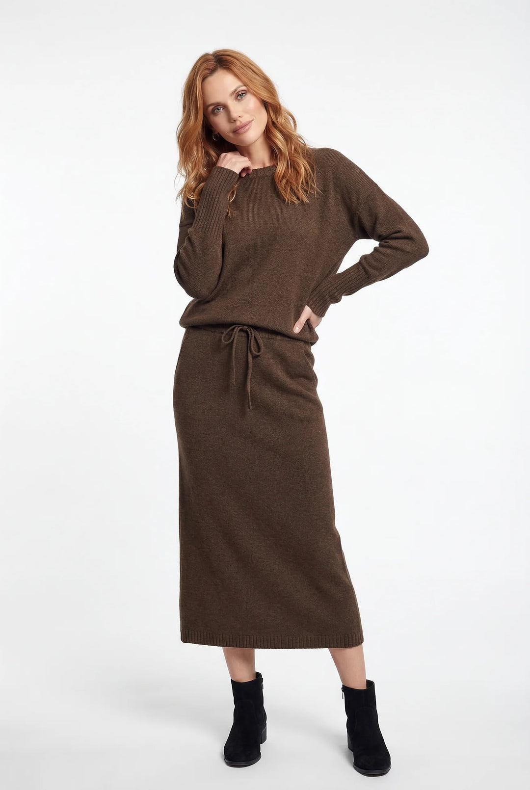 Women's two-piece knitted set in taupe worn casually for relaxed weekend styling