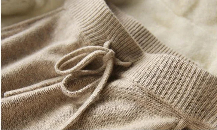 Model wearing taupe knitted co-ord set for versatile autumn winter styling
