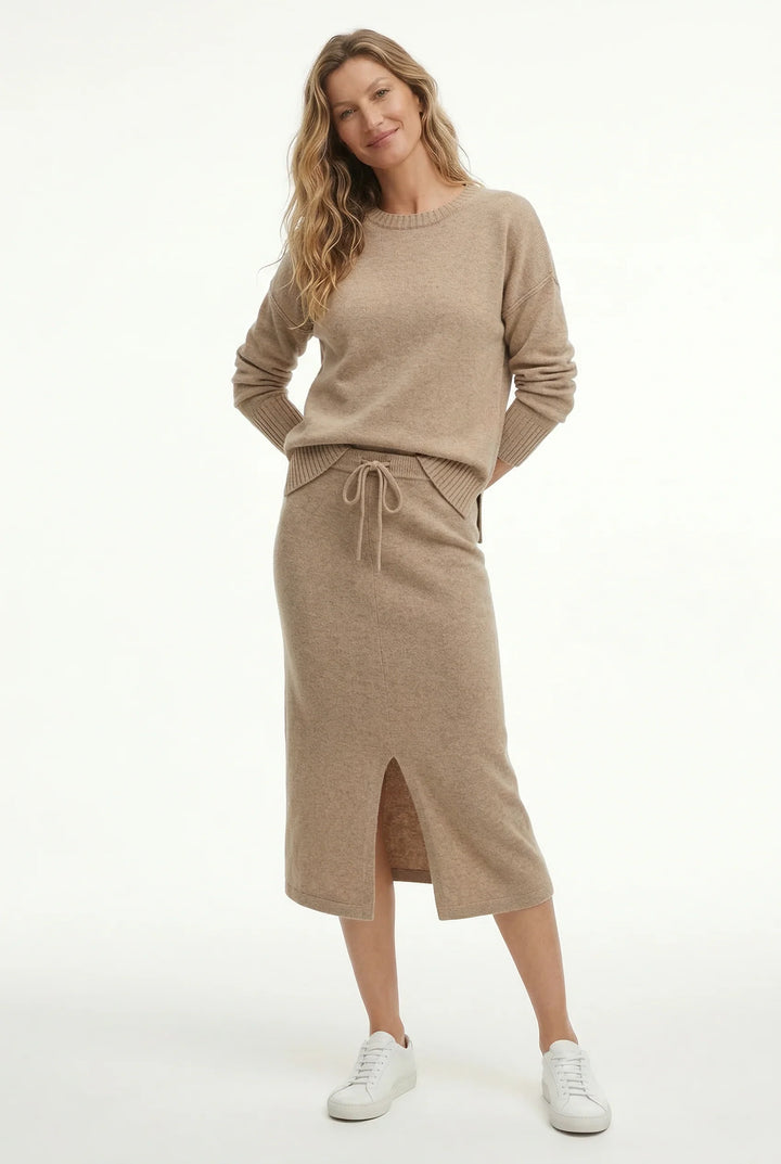 Women's knitted co-ord set in taupe displayed on neutral background showing coordinated design