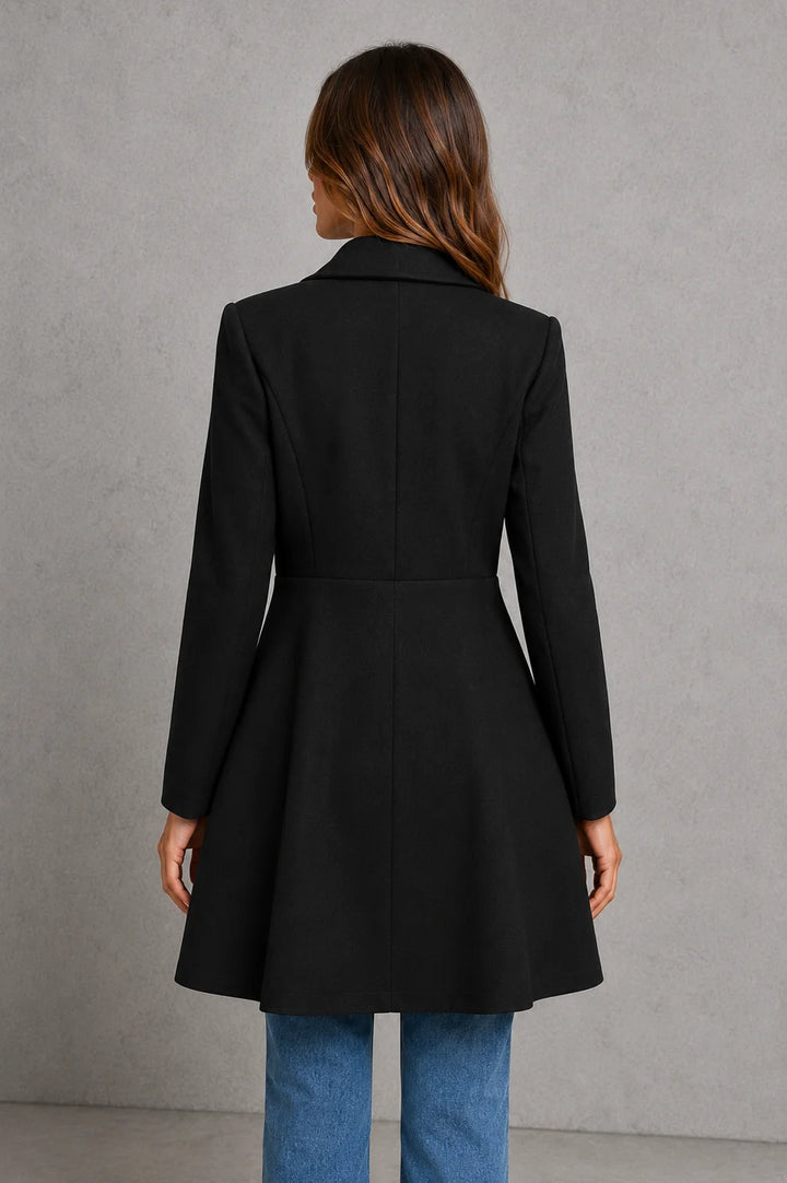 Black tailored longline coat with double-breasted detailing and structured fit