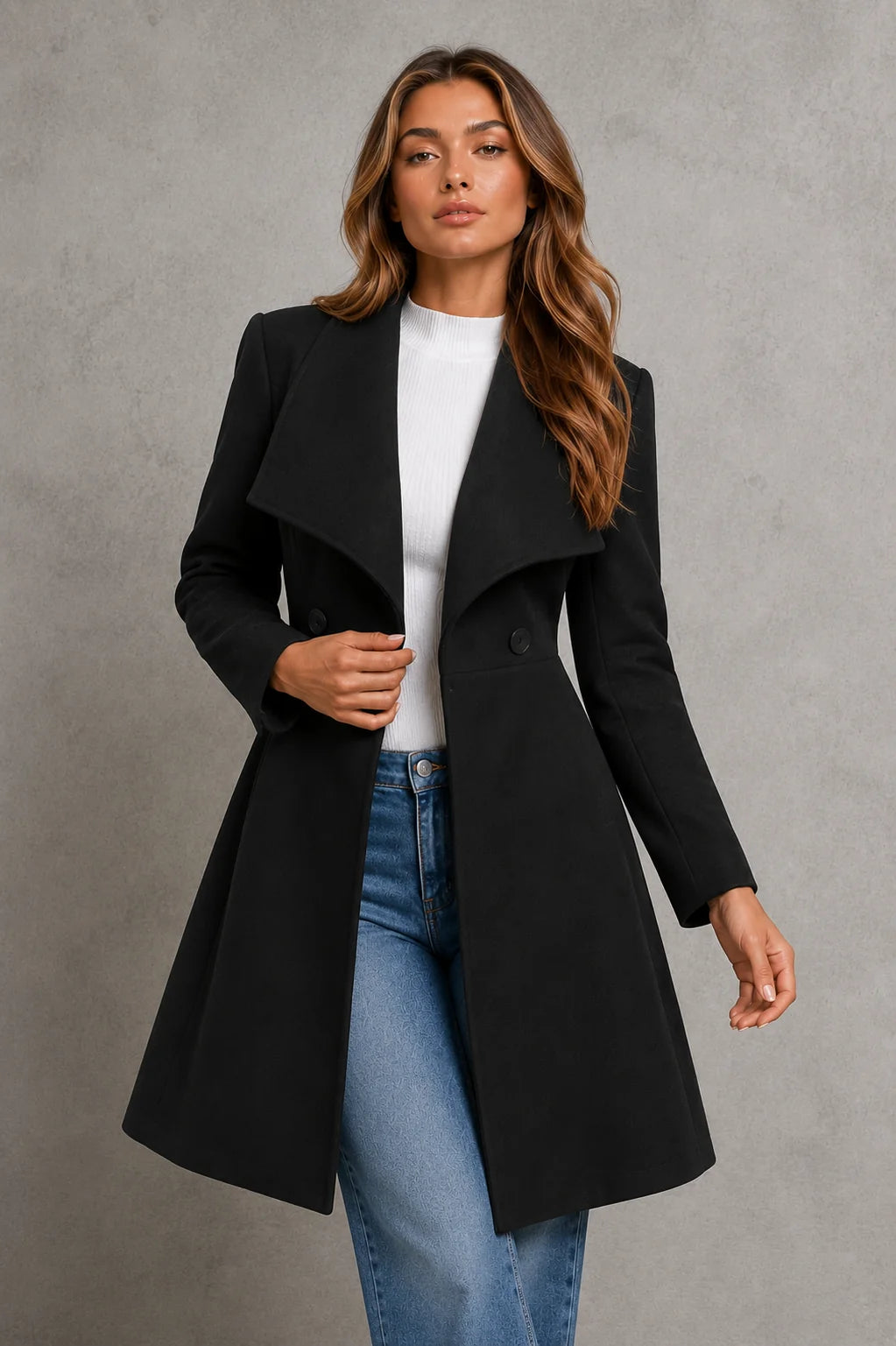 Detail shot of structured fabric and smooth finish on women's longline coat