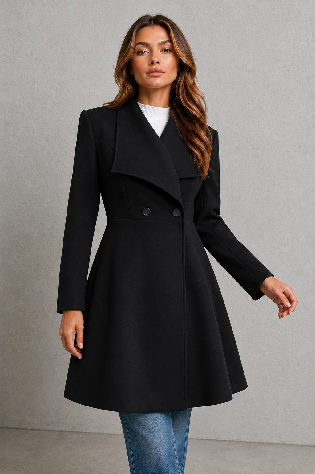 Back view of tailored coat showing clean lines and longline silhouette