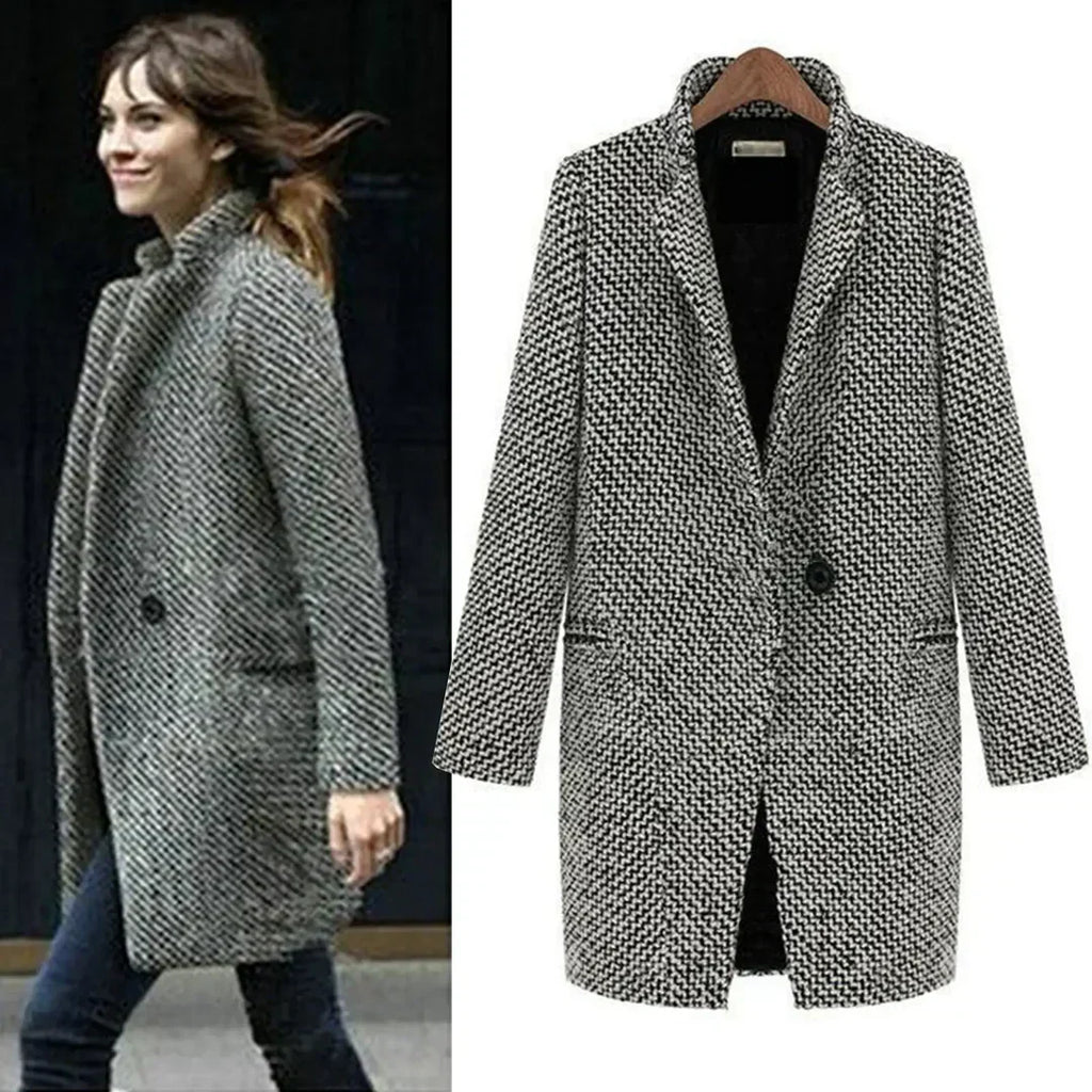 Close-up view of the textured woven fabric and relaxed fit of the longline coat