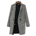 Side profile showing the below-hip length and structured drape of the women's coat