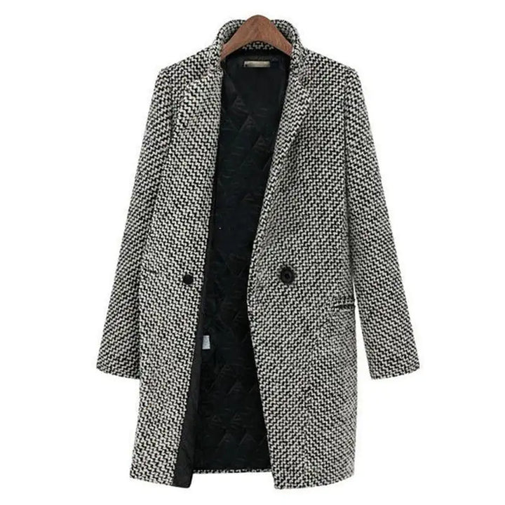 Side profile showing the below-hip length and structured drape of the women's coat