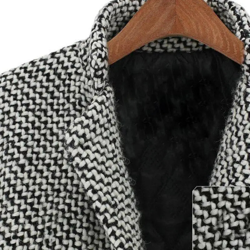Full-length view of the women's textured coat styled with casual winter layers