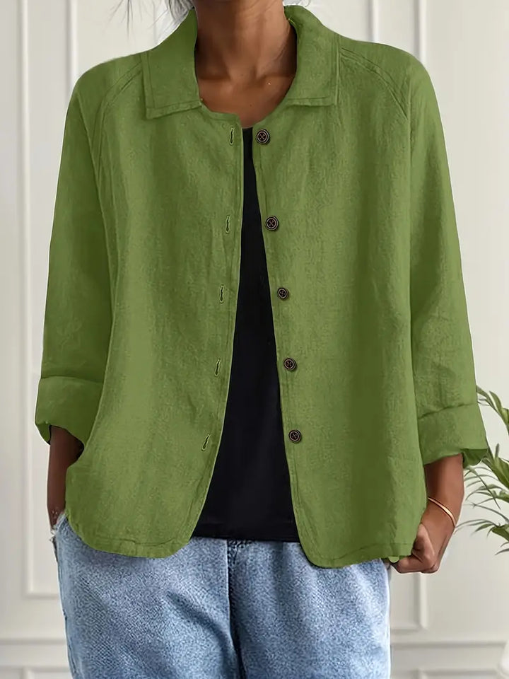 Full-length view of women's relaxed fit button-front shirt with open collar