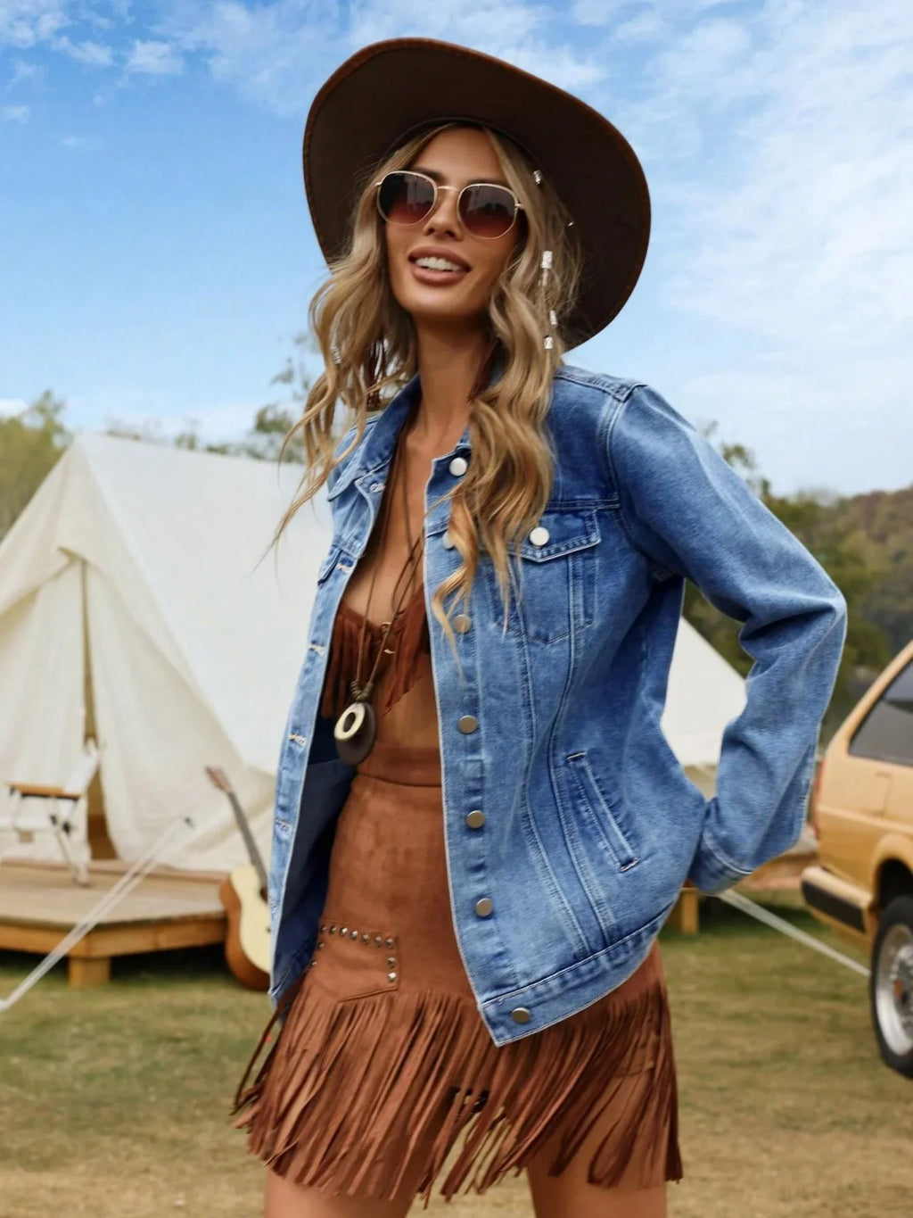 Close-up view of women's denim jacket showing collared neckline and button-front detail