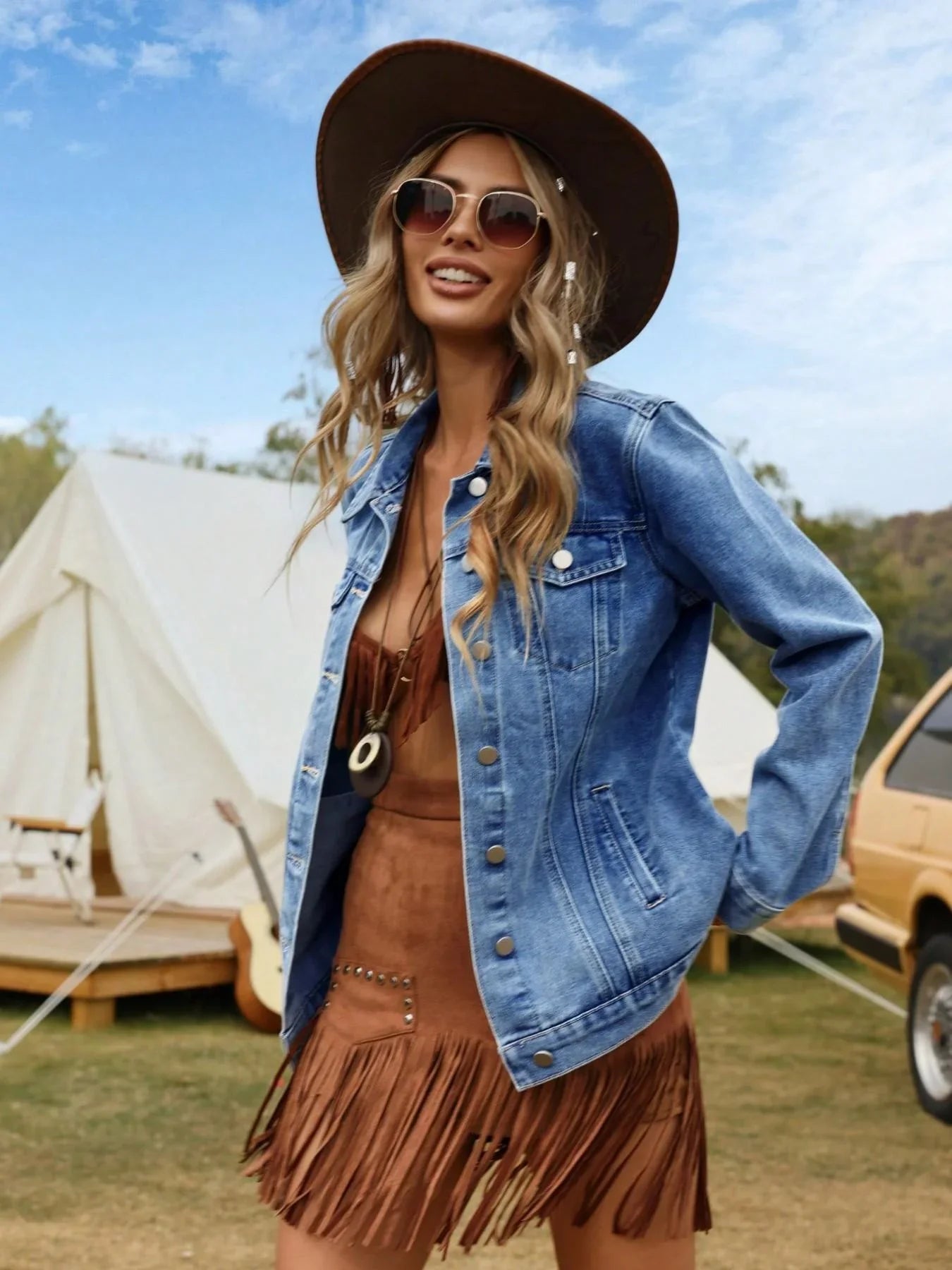 Close-up view of women's denim jacket showing collared neckline and button-front detail