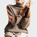 Side angle of relaxed fit herringbone jumper with contrast stripe on shoulder and sleeve