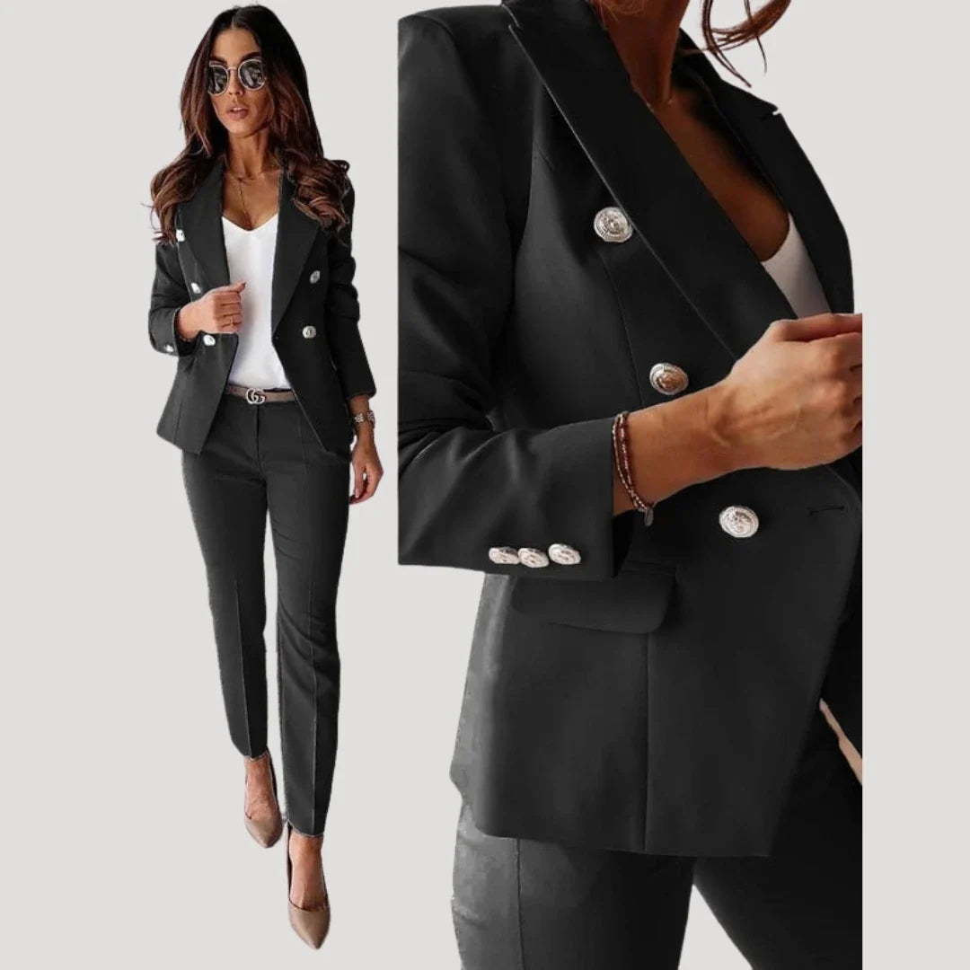 Women's double breasted tailored blazer set in black with matching trousers and silver buttons
