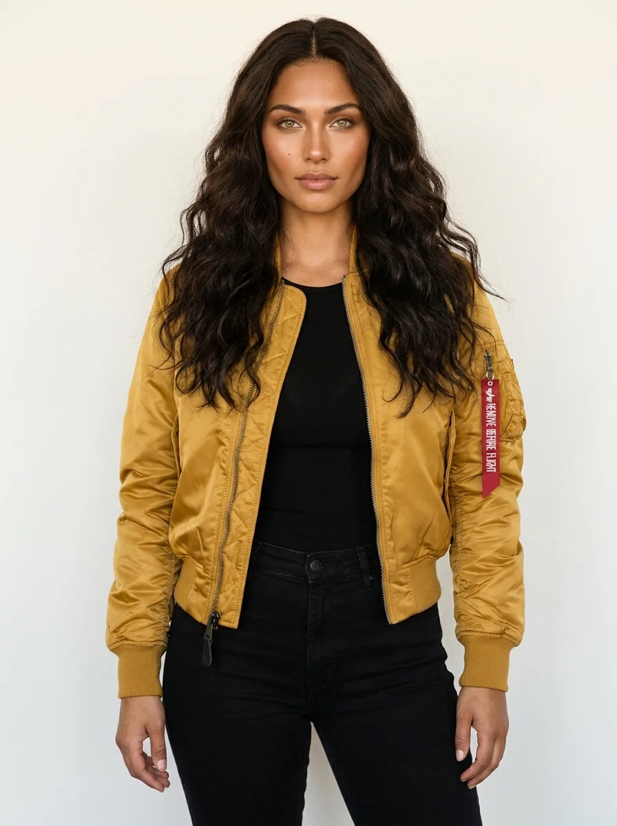 Detail of zip hardware and pocket construction on women's bomber jacket