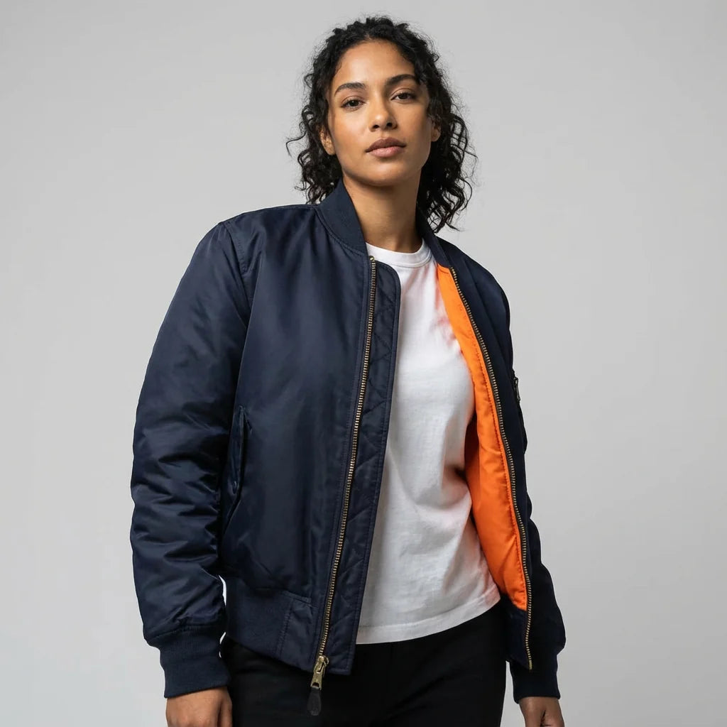 Side profile of women's bomber jacket showing relaxed fit and structured shape
