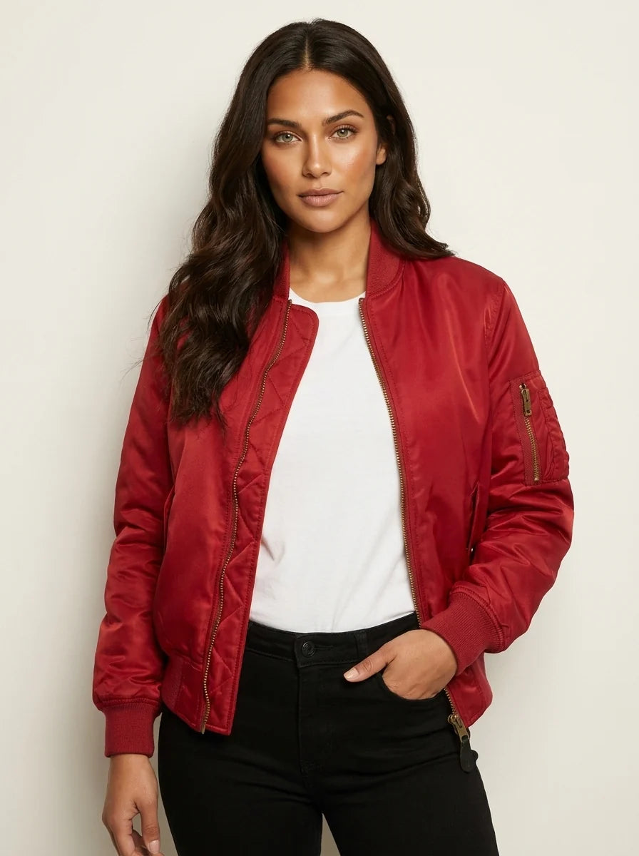 Close-up view of women's satin bomber jacket showing zip front and smooth finish