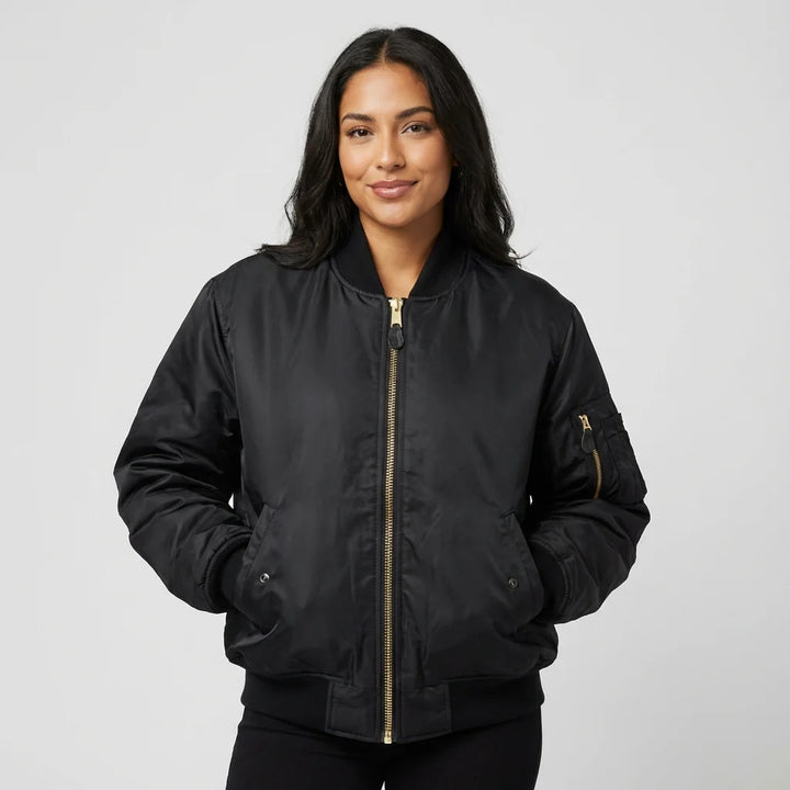 Close-up of ribbed collar and cuffs on women's satin bomber jacket