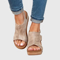 Women's wedge sandals in beige with wide crossover strap and cork-effect platform sole
