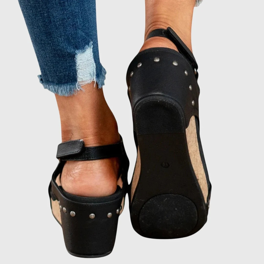 Women's cork wedge sandals offering lift and stability for all-day wear