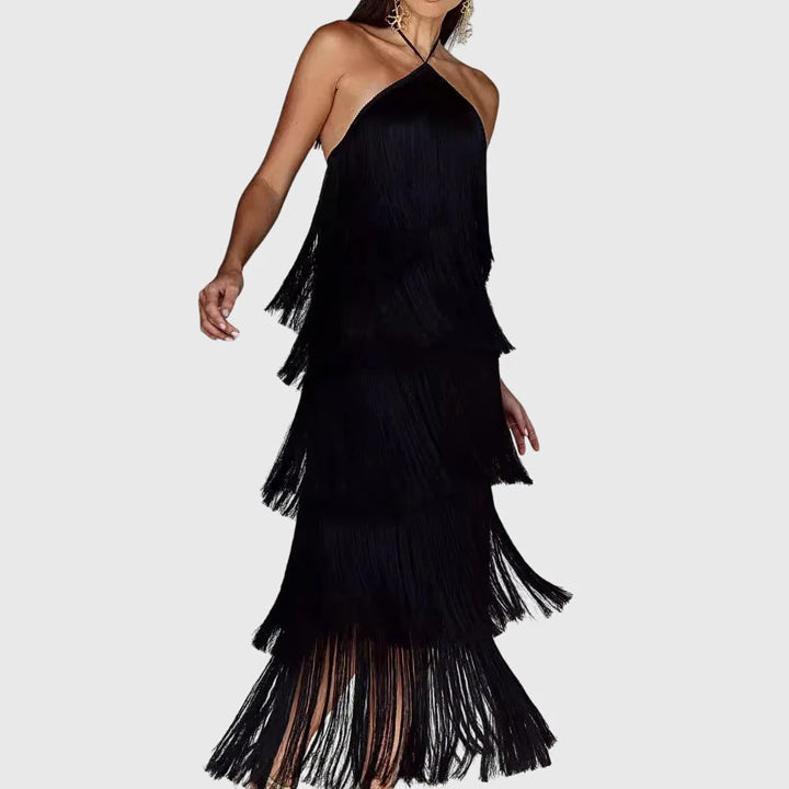 Full length halter neck fringe dress with multi-tiered tassels creating dramatic movement