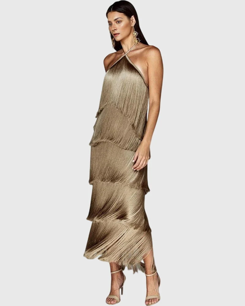 Back view of fringe dress showing open back design and halter neck fastening detail