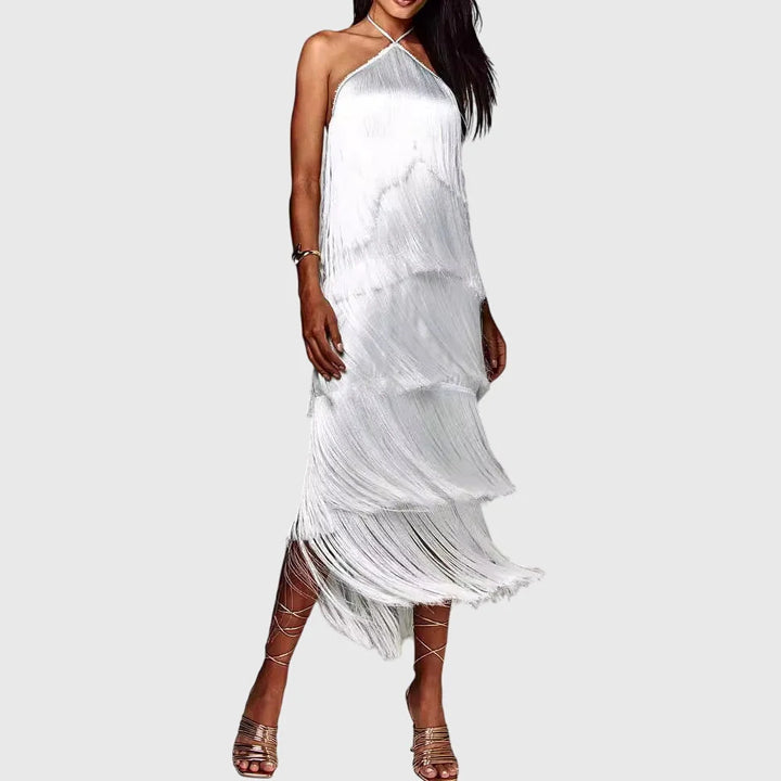 Halter neck fringe dress styled for evening events with statement tassel detailing