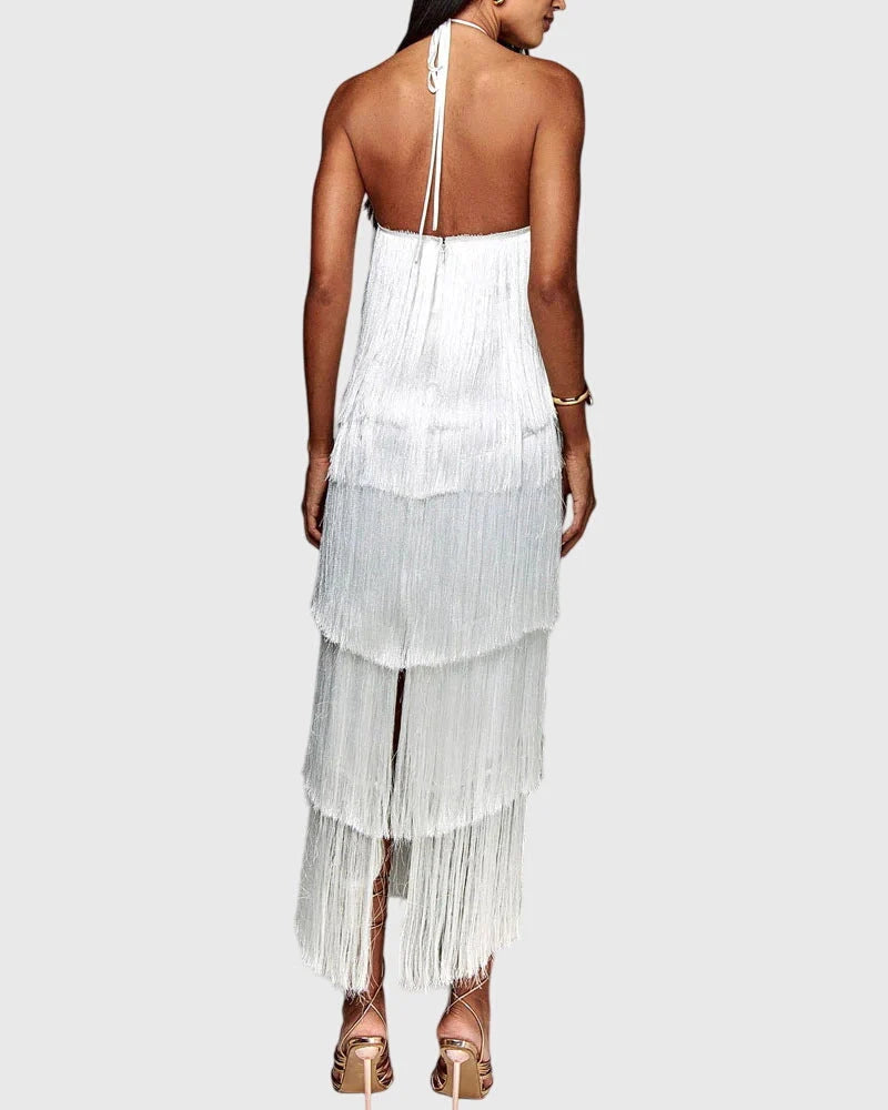 Movement shot of fringe dress showing cascading tassels and flowing party silhouette