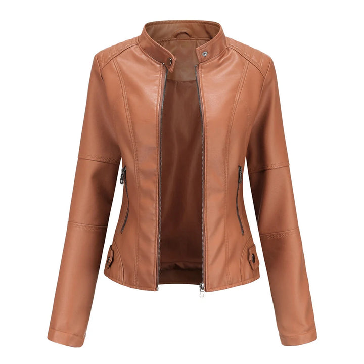 Close-up of women's biker jacket stand collar with snap-button detailing and zip closure