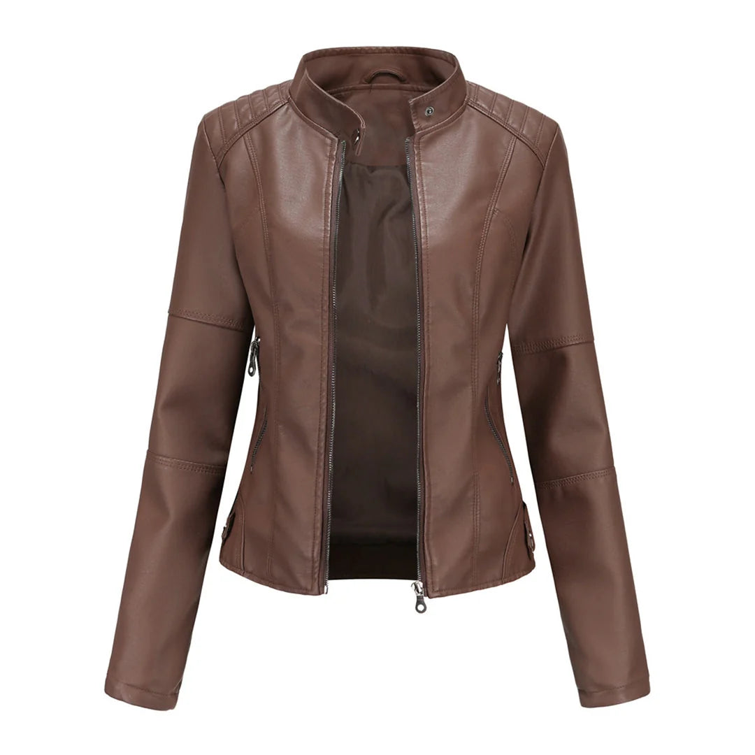 Women's biker jacket detail showing zippered side pocket and visible seam construction