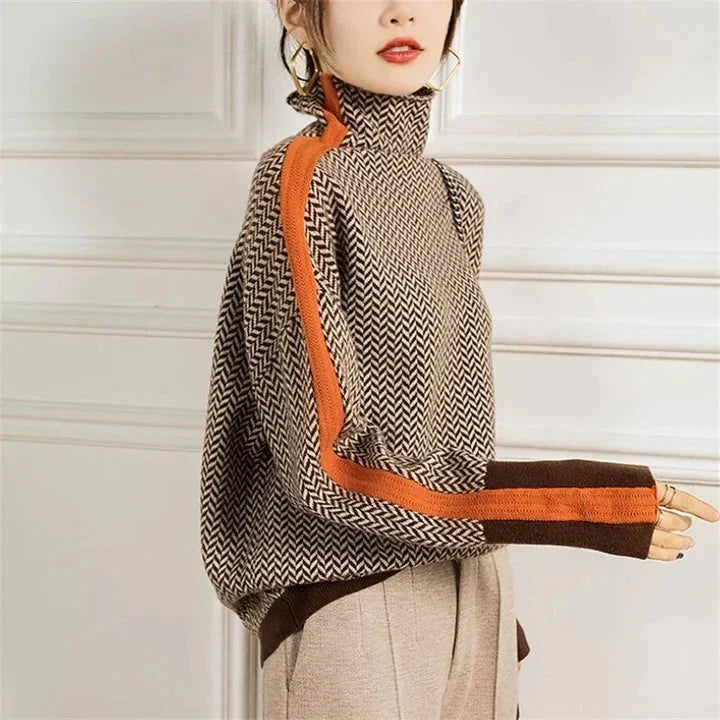 Detail of polo neck collar and ribbed cuffs on women's herringbone jumper