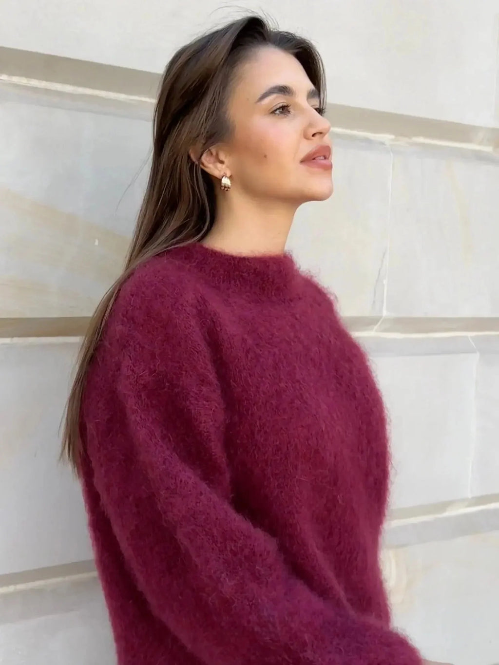 Detail shot of fluffy textured knit jumper with ribbed cuffs and hem