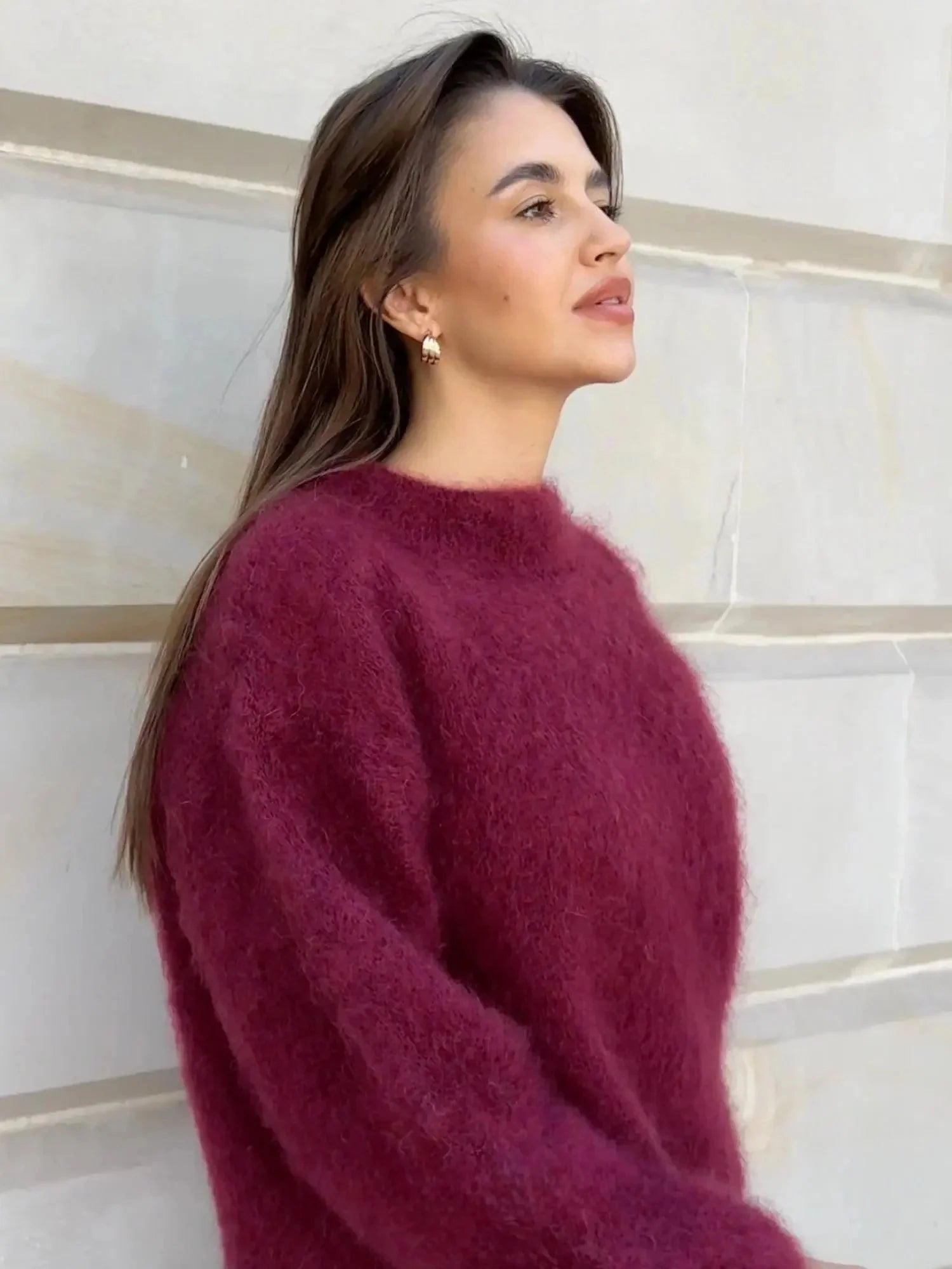 Detail shot of fluffy textured knit jumper with ribbed cuffs and hem