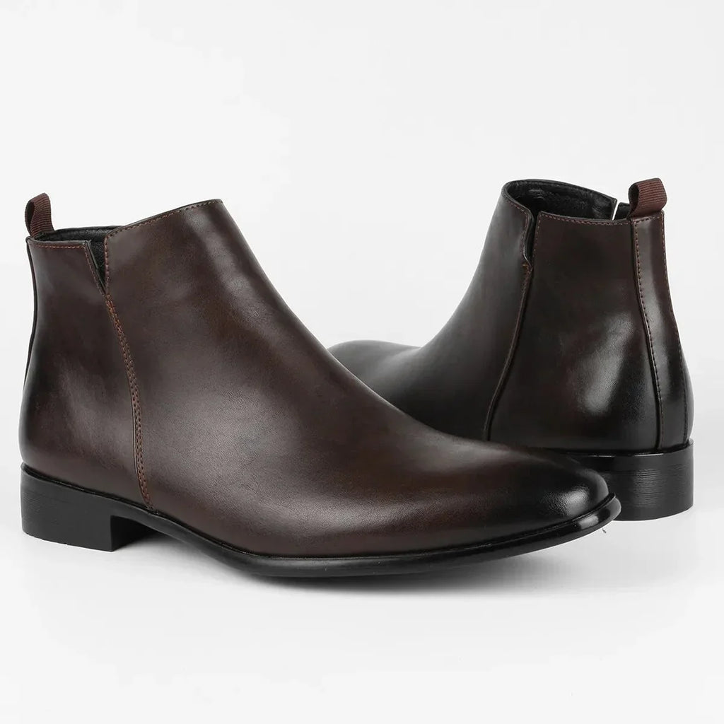 Pair of men's Chelsea boots with smooth finish and streamlined silhouette
