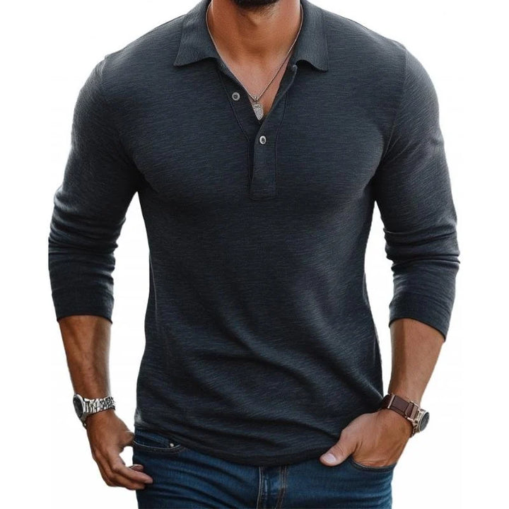 Full-length view of men's long sleeve polo shirt styled with dark denim jeans