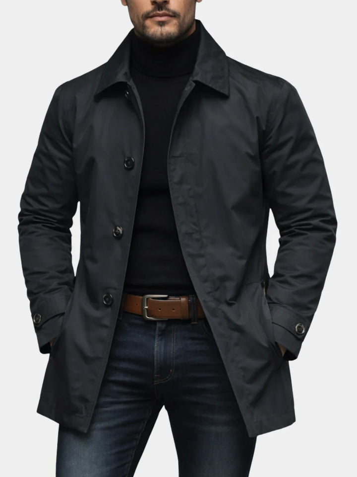 Men's quilted trench coat in charcoal grey with button-front closure and notched collar