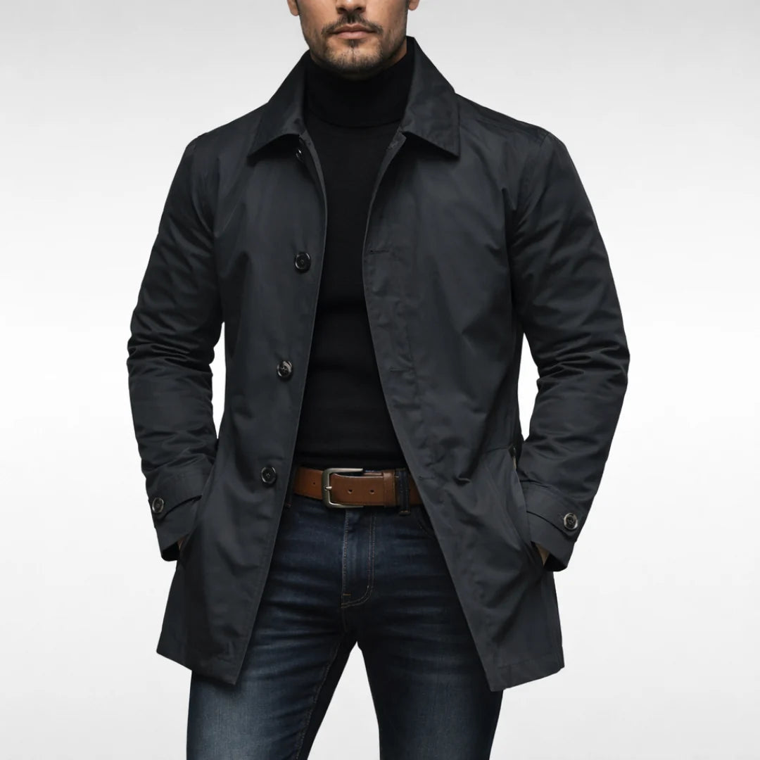 Close-up of men's trench coat showing structured fabric and button detail