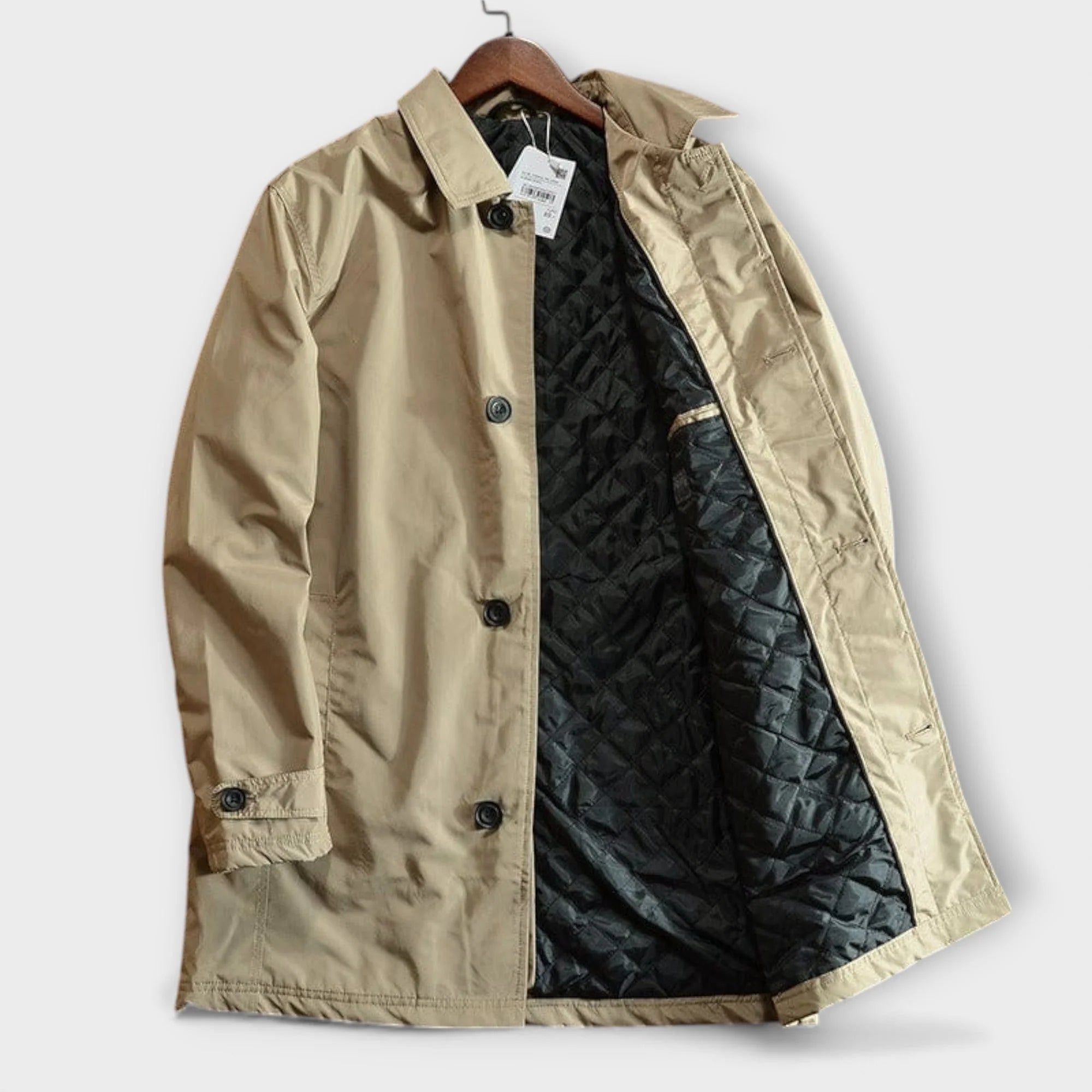 Back view of men's tailored trench coat showing structured shoulders and length