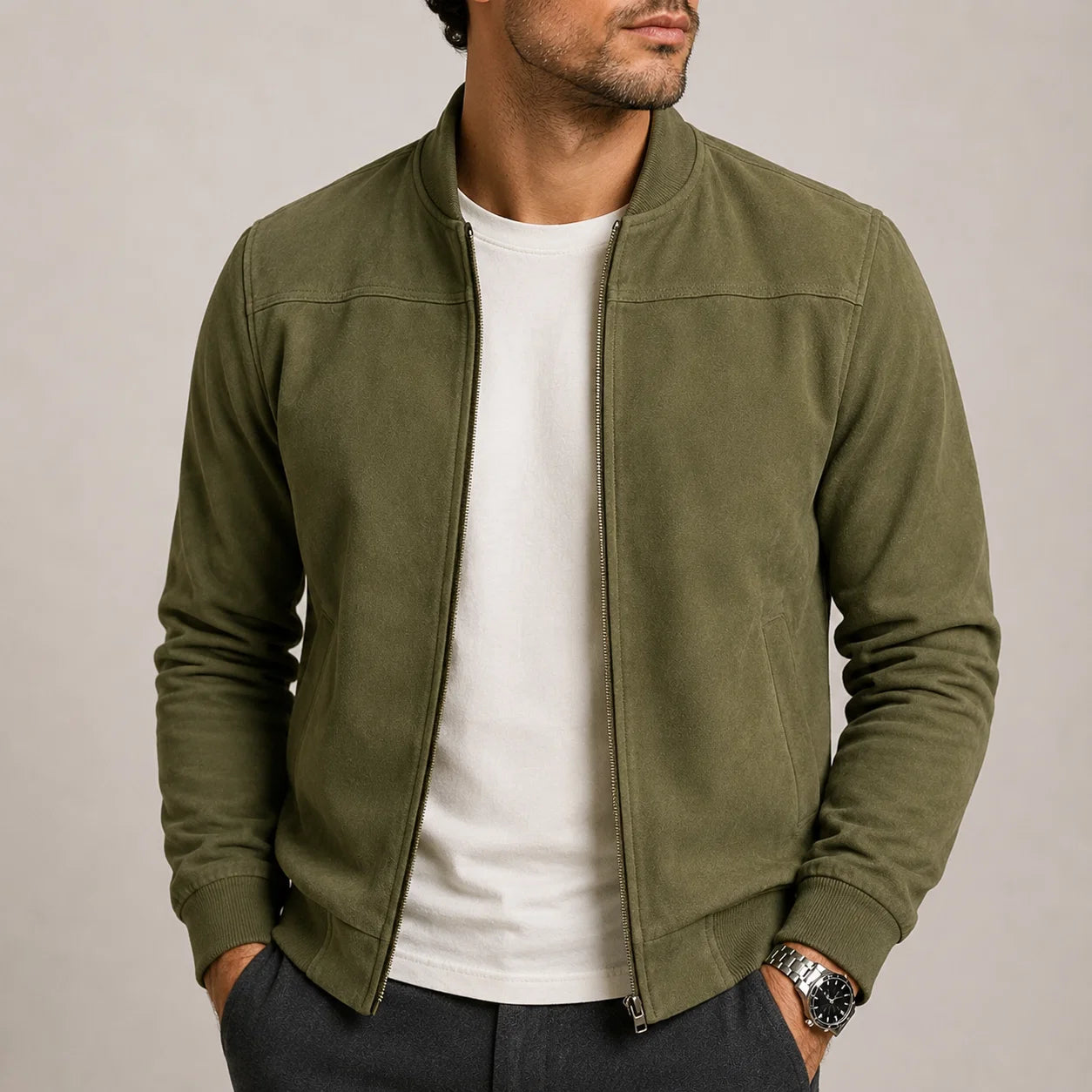 Side profile of men's bomber jacket with slip pockets and relaxed fit silhouette