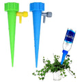 Automatic plant watering spikes in green and blue with adjustable valves shown alongside demonstration with bottle and potted plant