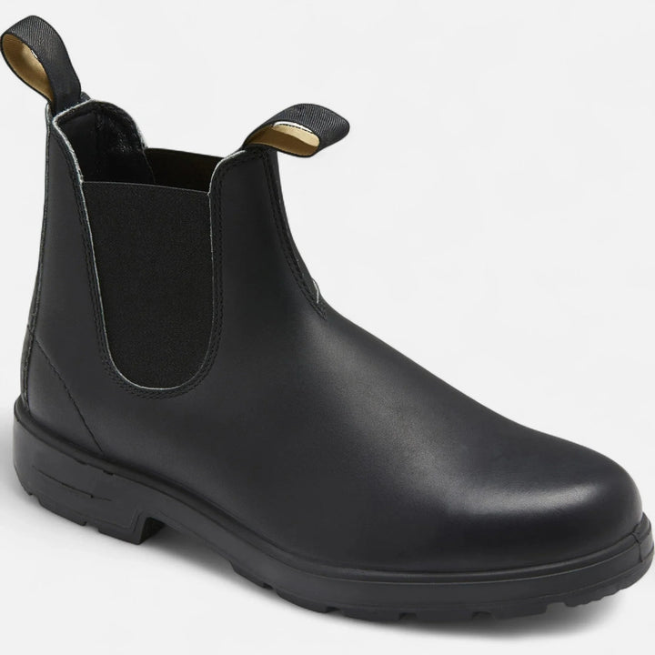 Close-up of Chelsea boot elasticated side panel and contrast stitching on brown upper