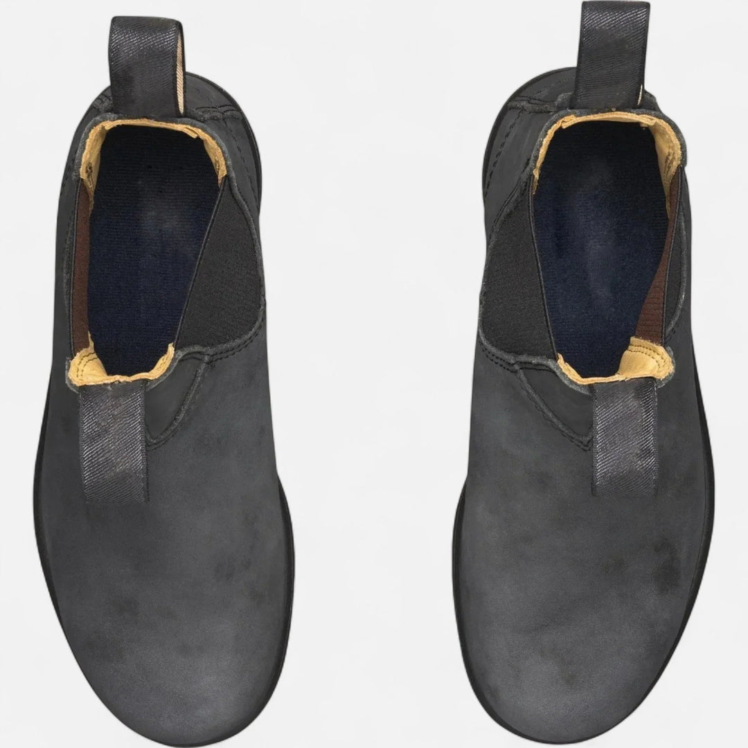 Ankle boots for men featuring slip-on construction and contrast fabric pull tabs
