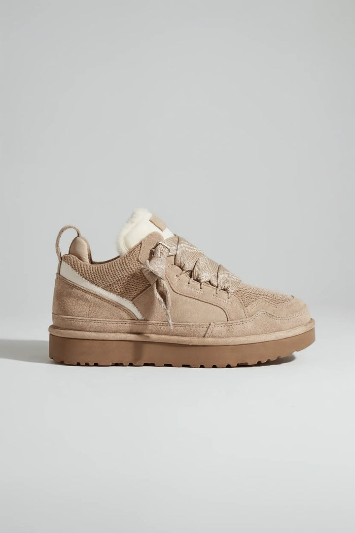 Men's platform trainers in beige with faux fur collar and ridged sole, side view