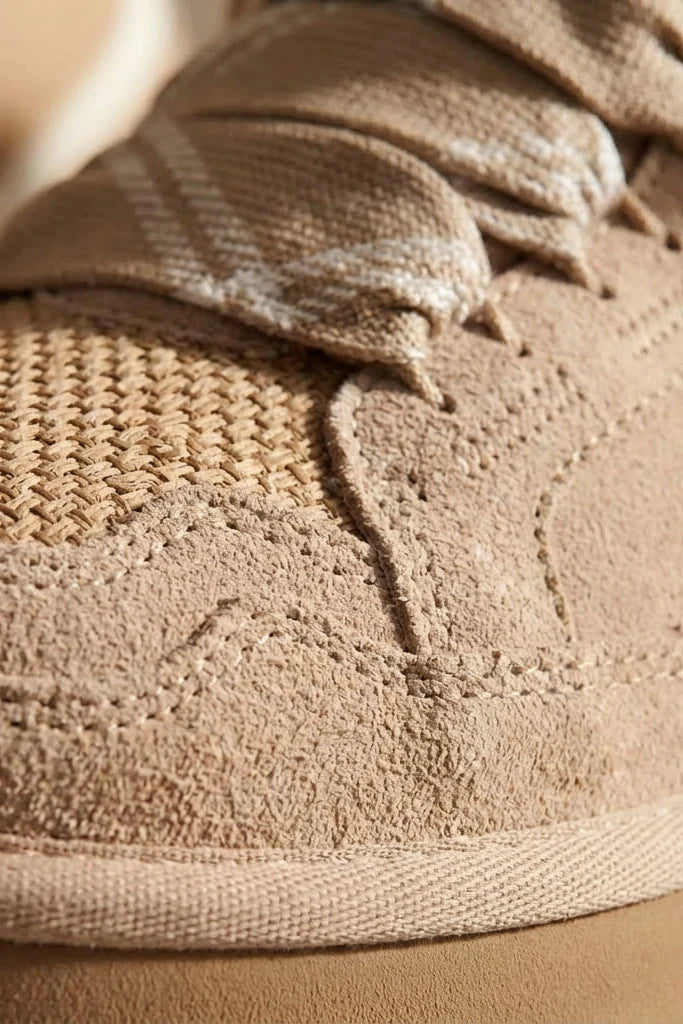 Men's beige platform trainers front angle view highlighting chunky ridged sole